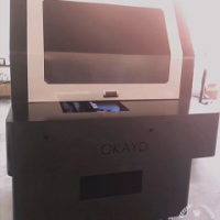 采用uv油墨预固化系统喷印机苏州欧可达高精度UV喷印机